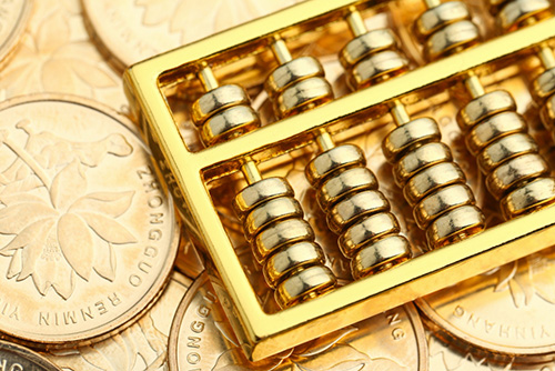 abacus-oro-monedas-oro-rmb-chino-como-fondo